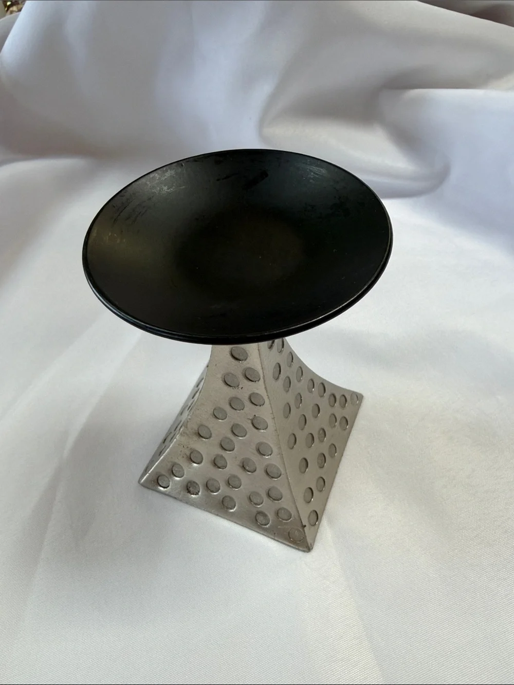 Pier 1 vintage silver and black candlestick. Good condition. Approximately 5”.